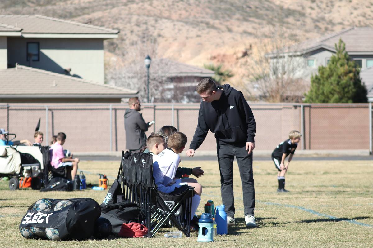 Coach Ryan coaching a session on the field
